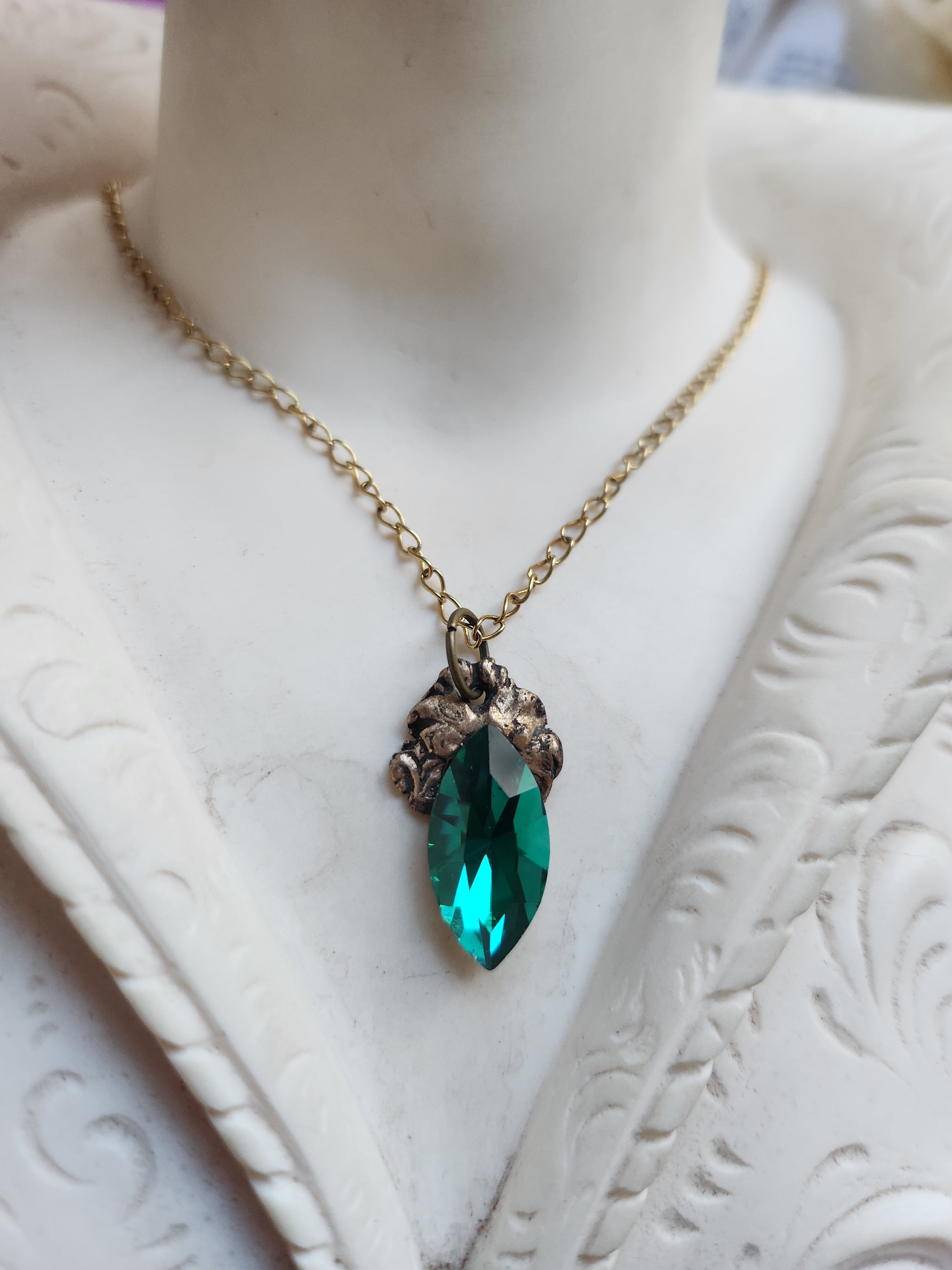 Arcane Resonance Collection – Handmade Bronze Pendant with Emerald Green Navette Crystal