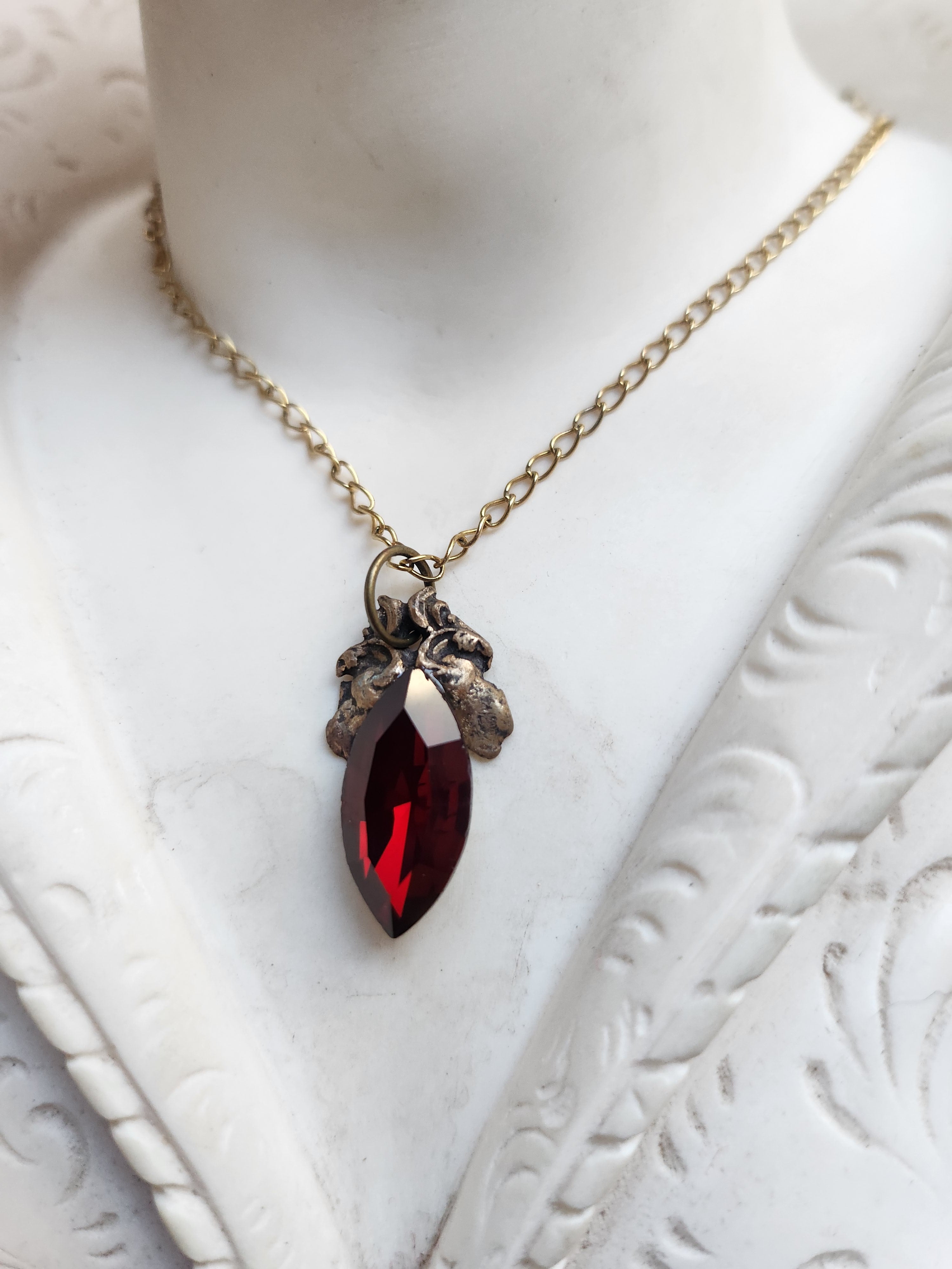 Arcane Resonance Collection – Handmade Bronze Pendant with Deep Red Navette Crystal