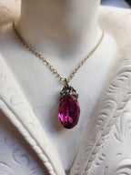 Arcane Resonance Collection – Small Handmade Bronze Pendant with Fuchsia Oval Crystal