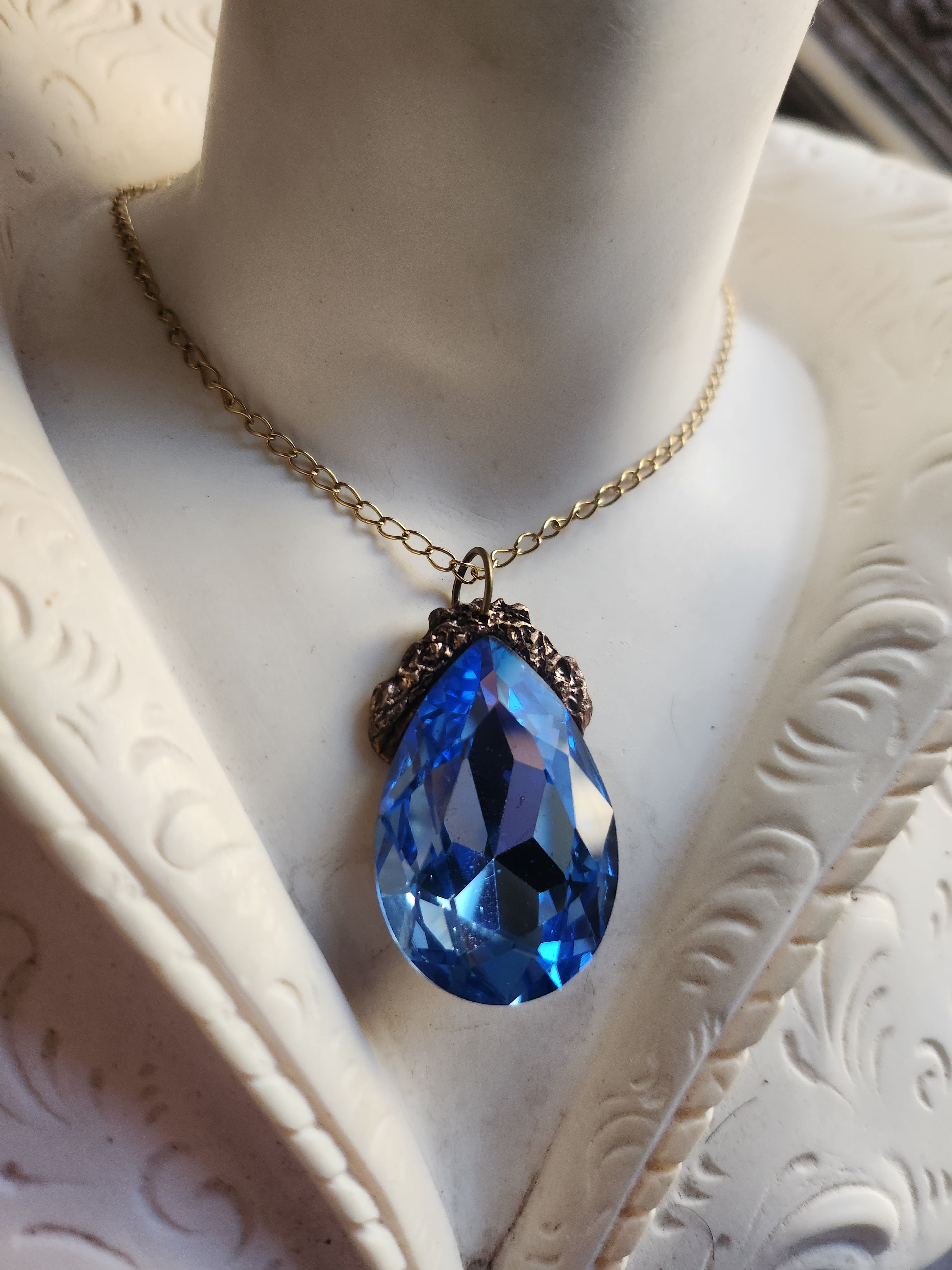 Mystic Baroque Collection – Handmade Bronze Pendant with Light Blue Teardrop Crystal