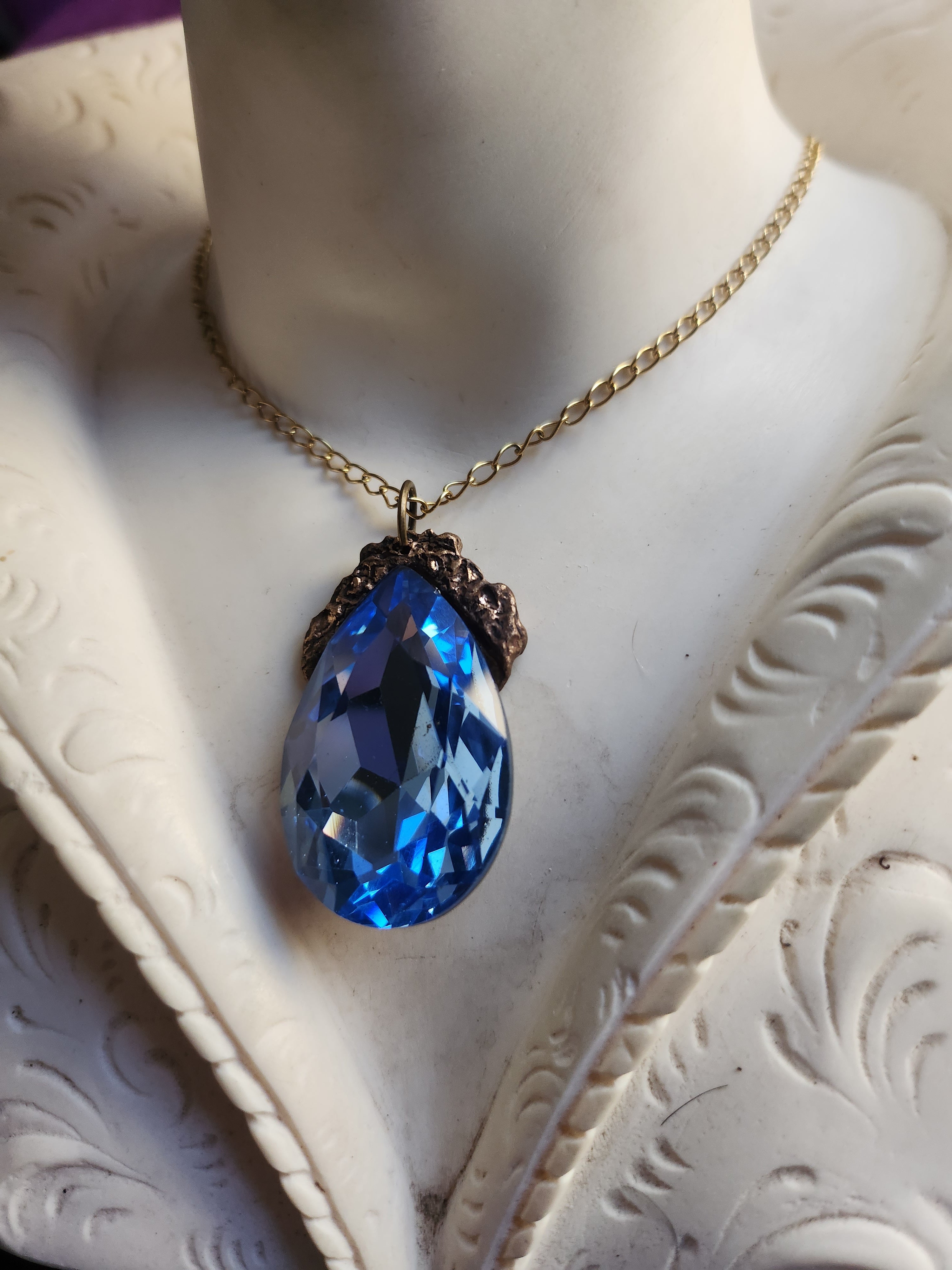 Mystic Baroque Collection – Handmade Bronze Pendant with Light Blue Teardrop Crystal