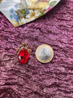 Colección Resonancia Arcana – Colgante de cobre hecho a mano con cristal ovalado rojo