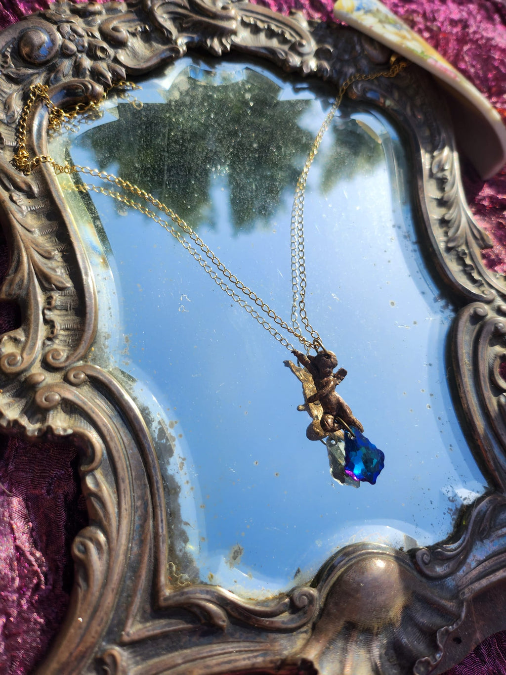 Echoes of Heaven Collection - Handmade Bronze Angel Pendant with Deep Sapphire Crystal