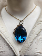 Mystic Baroque Collection - Handmade Bronze Pendant with Deep Blue Oval Crystal