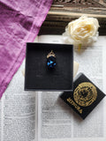 Arcane Resonance Collection – Small Handmade Bronze Pendant with Deep Blue Oval Crystal