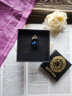 Arcane Resonance Collection – Small Handmade Bronze Pendant with Deep Blue Oval Crystal