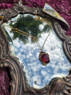 Arcane Resonance Collection – Handmade Bronze Pendant with Ruby Red Oval Crystal