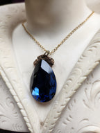 Mystic Baroque Collection - Handmade Bronze Pendant with Deep Blue Teardrop Crystal